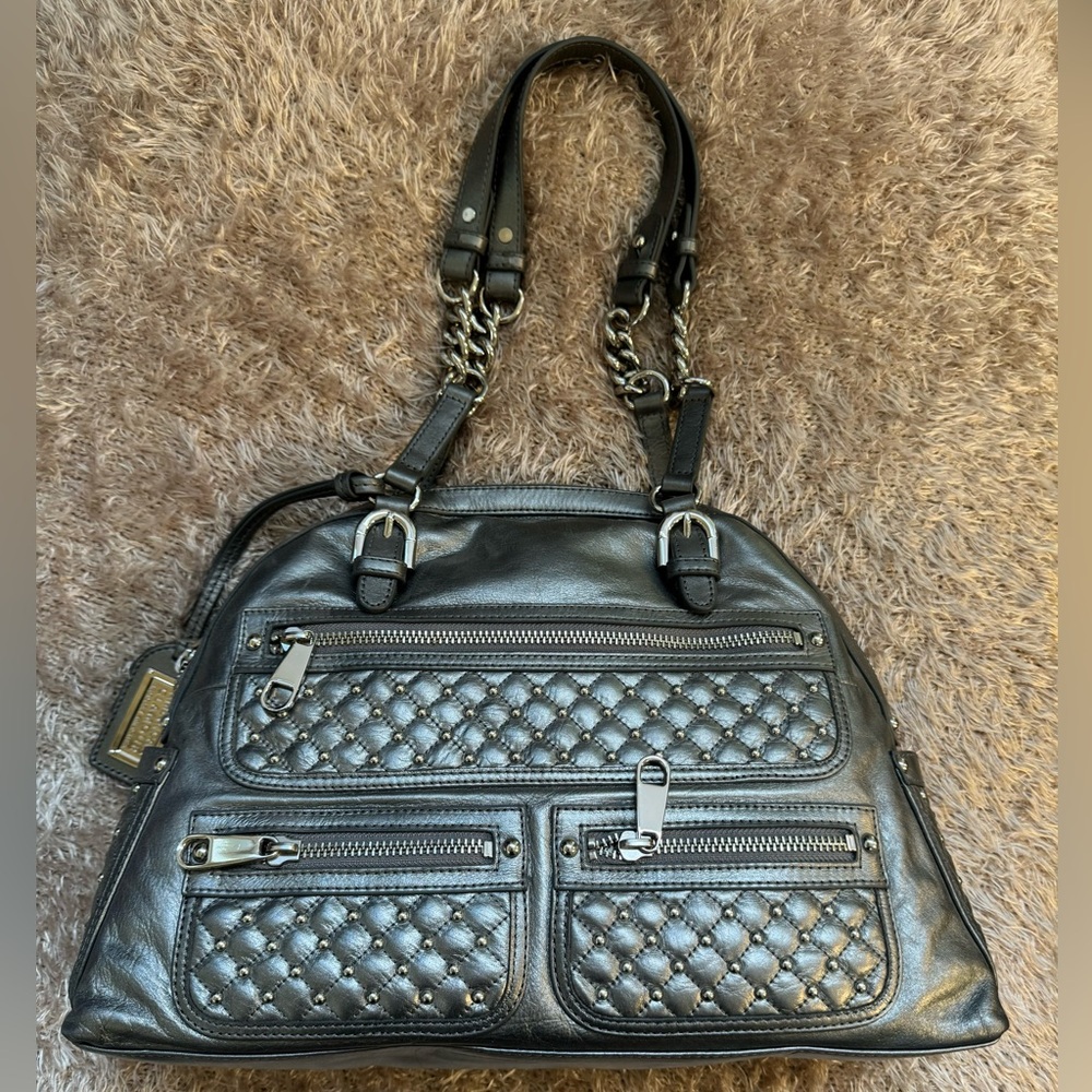 American Glamour by Badgley Mischka, silver shoulder bag with silver studs.